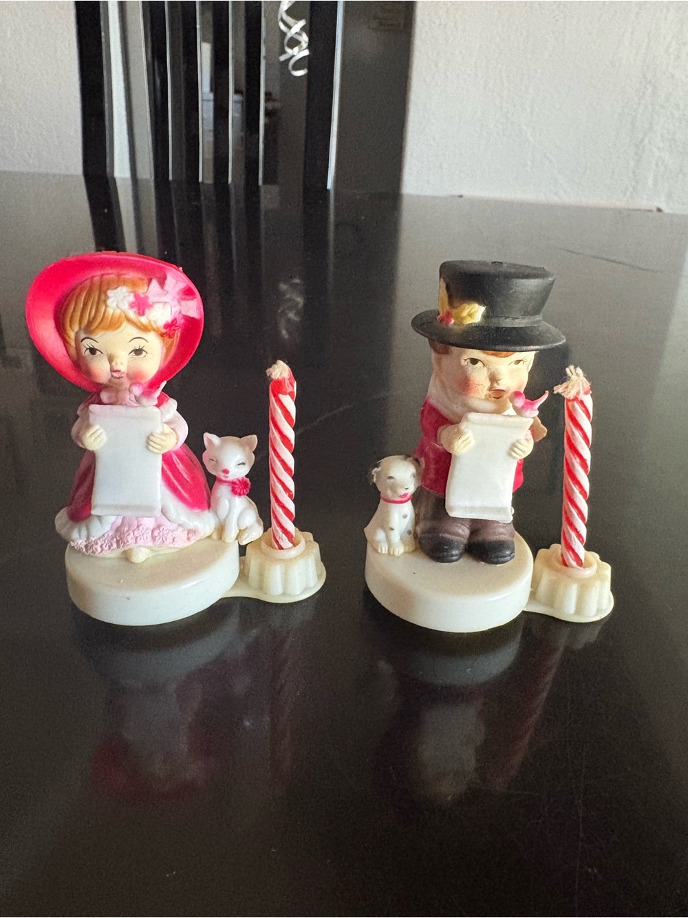 Boy & Girl Christmas caroler with candle